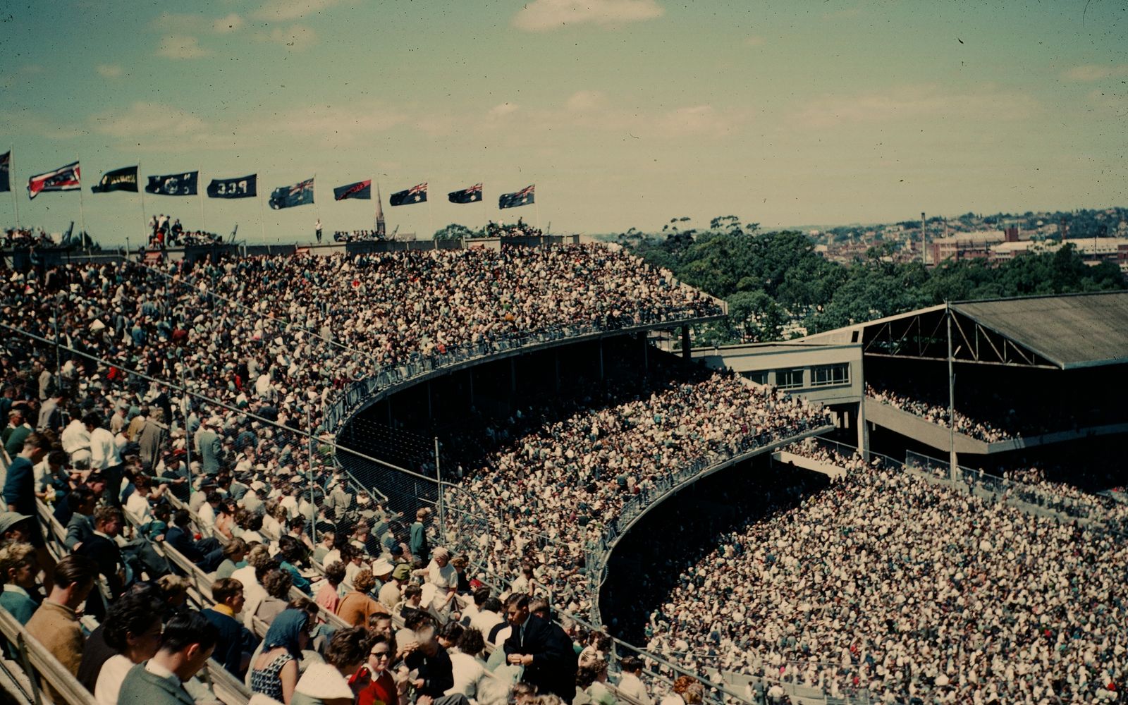A packed crowd at an Australian football match